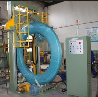 Large hose coil stretch wrapping