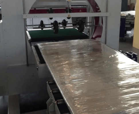 Orbital wrapping machine packing wooden doors, windows, moulding, profiles and posts