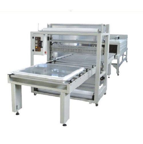 Door panel shrink wrapper machine